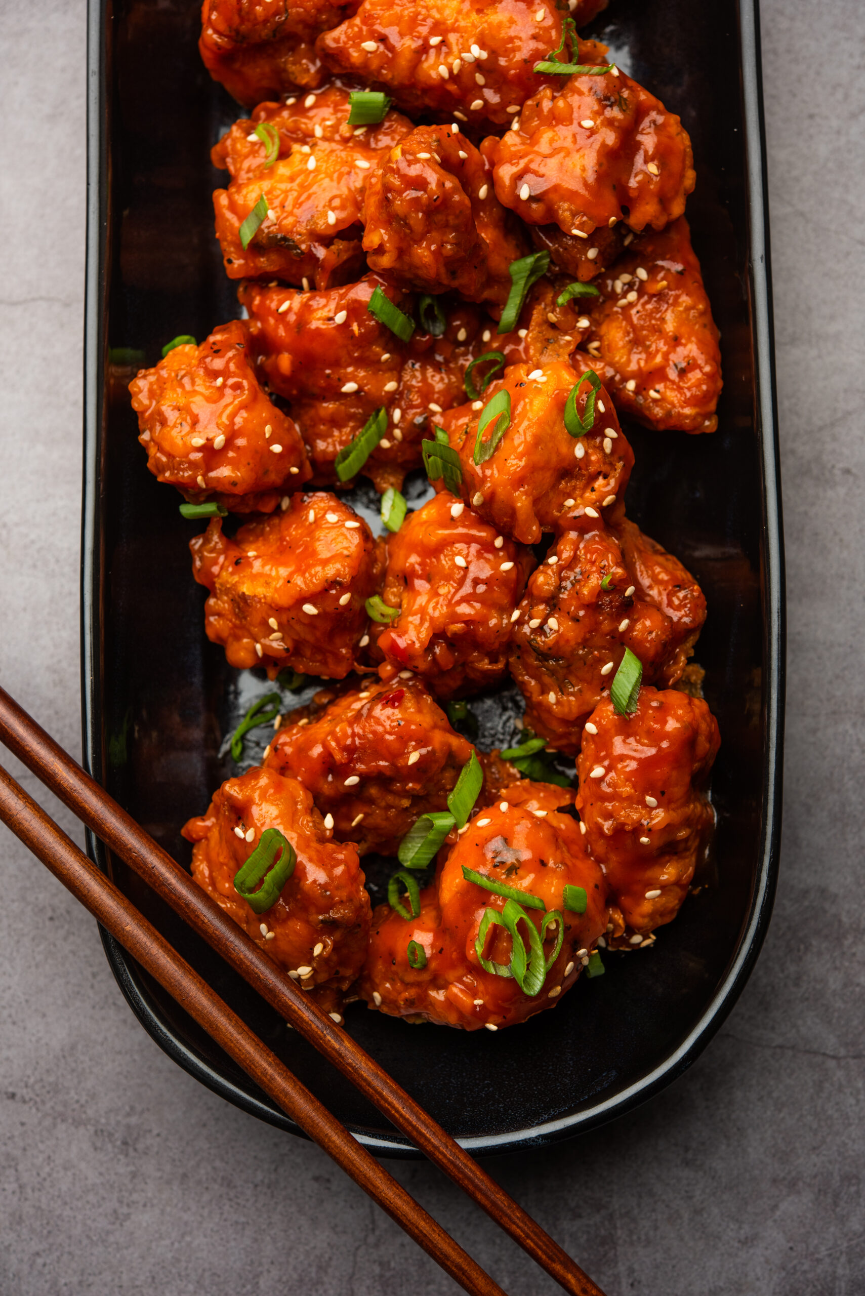 Chilli chicken dry is a popular Indo-Chinese dish of chicken of Hakka Chinese heritage